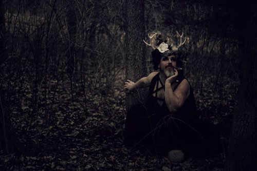 Forest fae with antler crown in nature - Kansas City fantasy photography