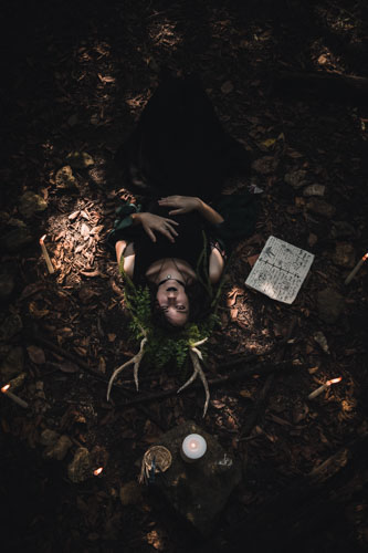 Witch ritual fantasy portrait with candles and spell elements - Kansas City